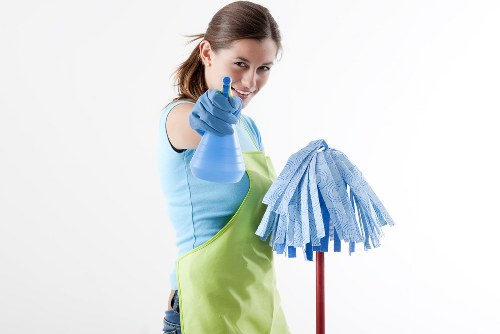 Cleaner reviewing safety procedures before starting work